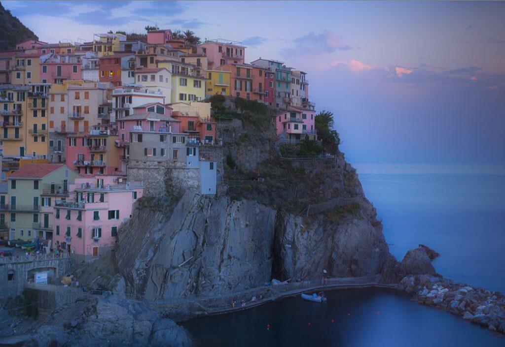 Italy - Slow Life in Liguria. Set among some of the most dramatic coastal scenery in Italy are the five medieval villages known as Cinque Terre. As cars are banned here, travel slow – by train and by foot. Idyllic days will be spent walking along breathtaking cliff paths and through terraced vineyards; pausing over gelato in cafés surrounded by candy-coloured houses; cooling off with a swim; capturing Instagram-worthy pictures of perfectly-preserved architecture; and just absorbing the old-world charm.